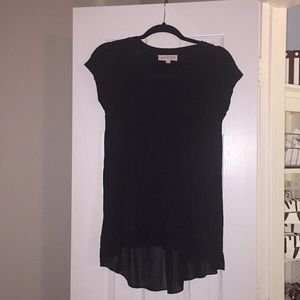 beautiful black top with pocket and pleated bottom
